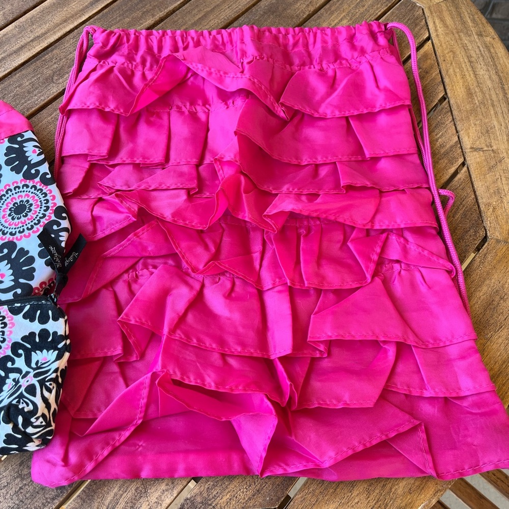 Thirty-one ruffle sling bag, small pouch, and thermal water bottle.
